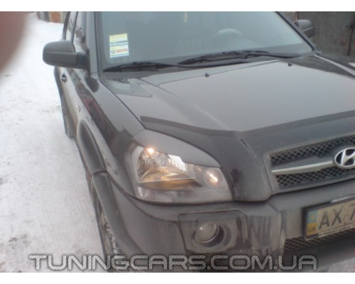 Накладки на фары (реснички) Hyundai Tucson JM (с вырезом) (под покраску) - 4244-00