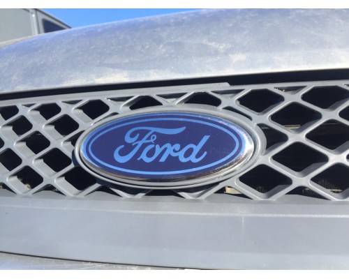 Эмблема передняя (на защелках) для Ford Fiesta 2002-2008 - 80743-11