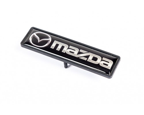 Шильдик для ковриков (1шт) Mazda - 77972-11