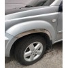 Накладки на арки (4 шт, нерж) для Nissan X-trail T30 2002-2007 - 79067-11